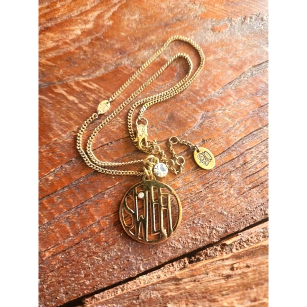 Juicy Couture 16-18-inch gold chain with "SWEET" charm and rhinestone
